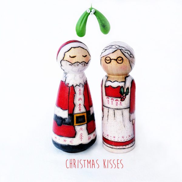kissing under the misteltoe, mistletoe kisses, christmas mistletoe, christmas card, christmas kisses